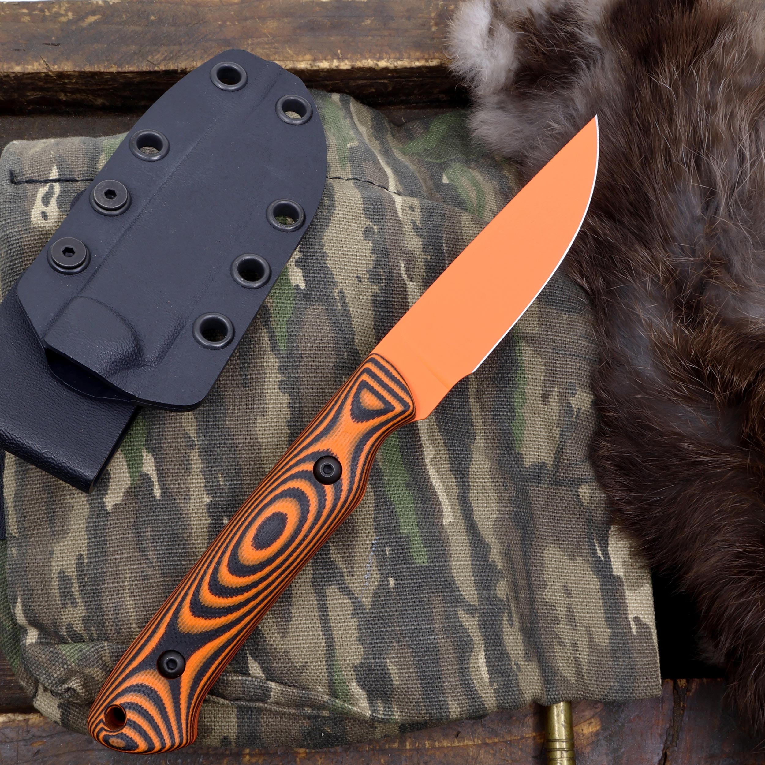 White River Small Game Orange/ Black G10, Magnacut