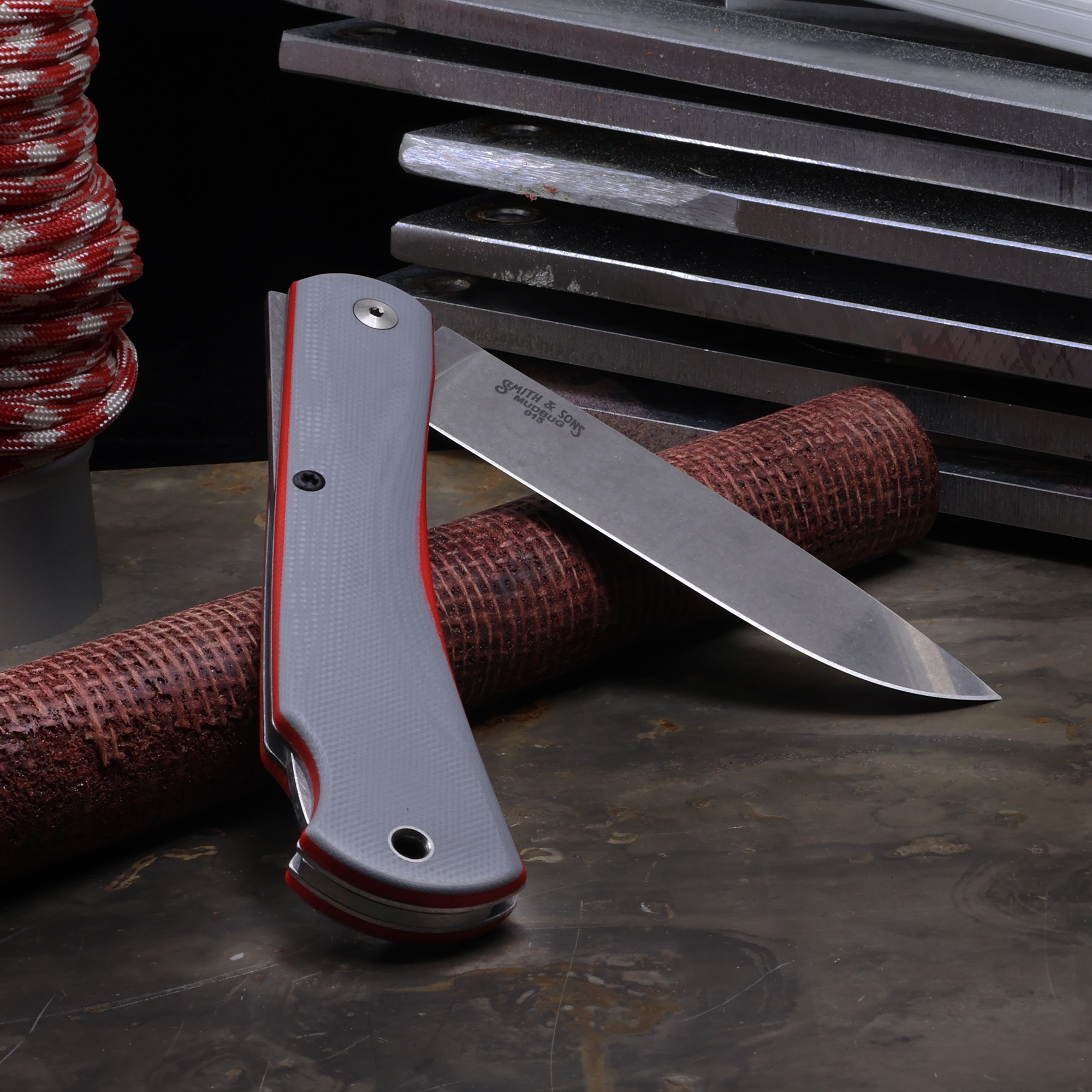 White River Mudbug, Gray G10/ Red Liner